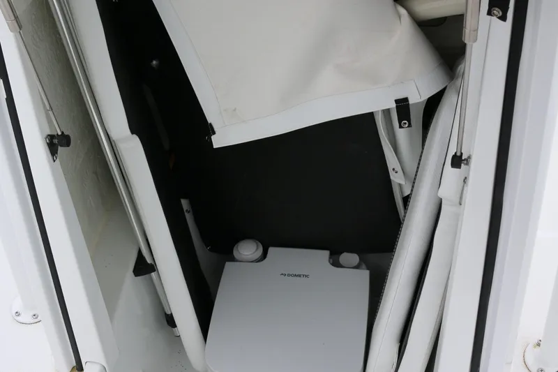 Slide: The Image of 2025 Wellcraft 202 Fisherman boat interior with Dometic equipment. - 34