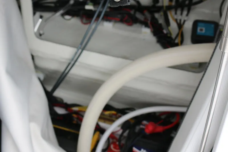 Slide: The Image of Interior wiring and components of a 2025 Wellcraft 202 Fisherman boat. - 40