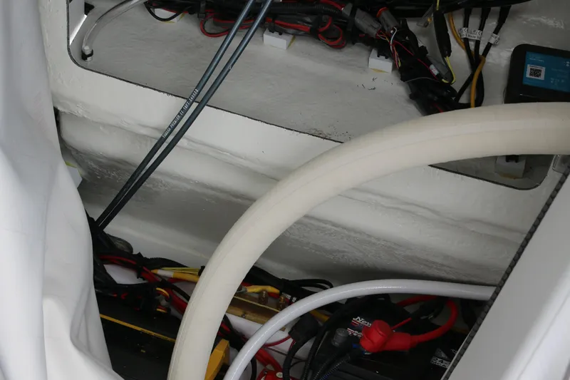Slide: The Image of Interior wiring and components of a 2025 Wellcraft 202 Fisherman boat. - 41