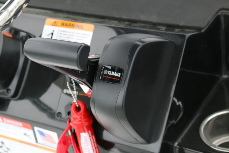 Slide: The Image of Close-up of Yamaha throttle control on 2025 Wellcraft 202 Fisherman boat dashboard. - 43