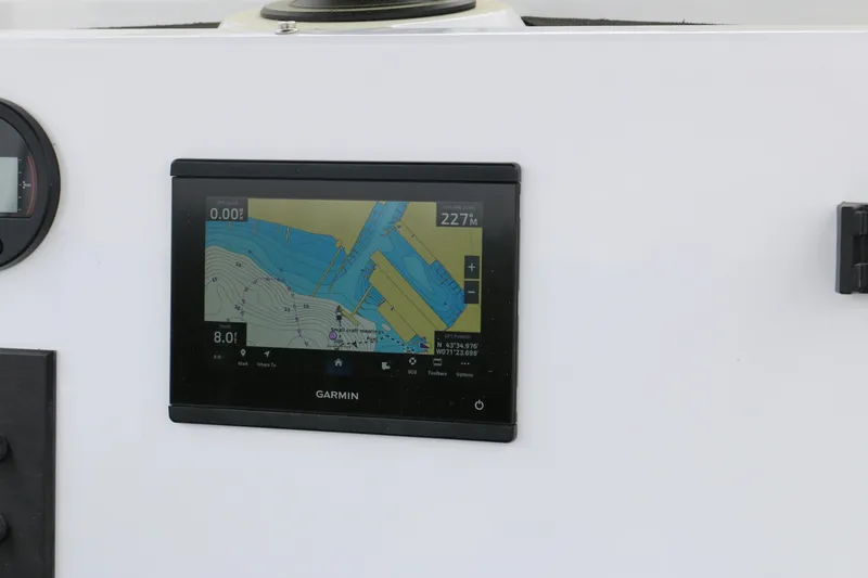 Slide: The Image of Garmin navigation display on 2025 Wellcraft 202 Fisherman boat dashboard. - 47
