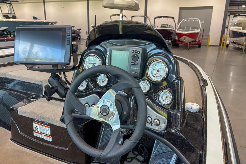 Slide: The Image of Dashboard of a 2013 Nitro Z6 boat with Garmin navigation system. - 13