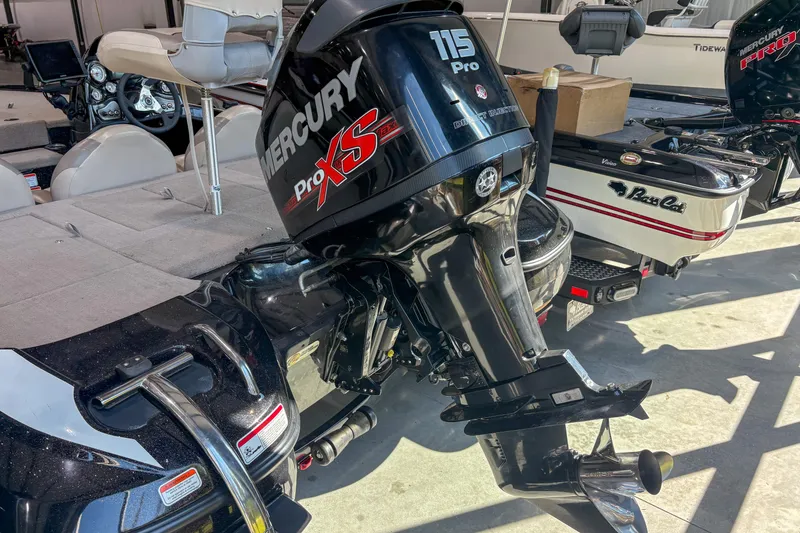 Slide: The Image of 2013 Nitro Z6 boat with Mercury Pro XS 115 engine in a showroom. - 5