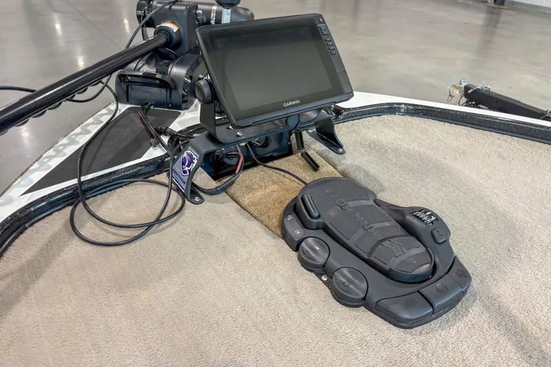 Slide: The Image of Trolling motor foot pedal and Garmin display on 2013 Nitro Z6 boat. - 8