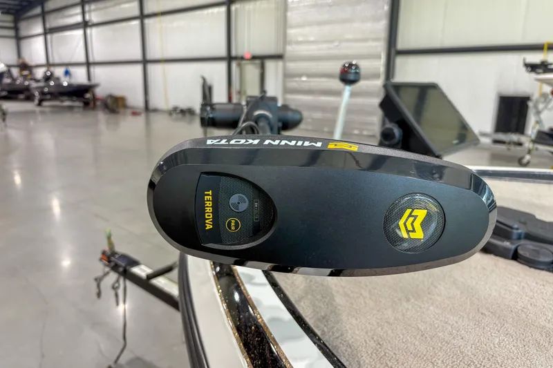 Slide: The Image of Minn Kota Terrova motor on 2013 Nitro Z6 boat in a spacious garage. - 9