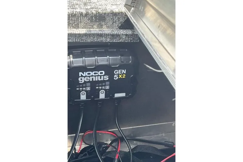 Slide: The Image of NOCO Genius GEN 5X2 charger installed in 2024 Tracker Pro 170 boat. - 10