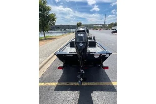 Slide: The Image of 2024 Tracker Pro 170 boat interior with seating and steering console. - 7