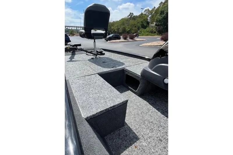 Slide: The Image of 2024 Tracker Pro 170 boat interior with seating and storage compartments. - 8
