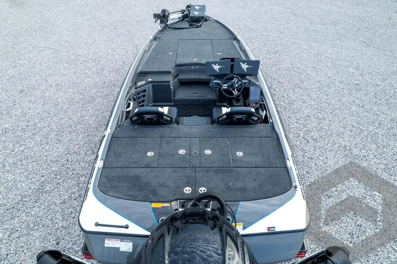 Slide: The Image of 2026 Skeeter FXR21 FLEX boat with spacious deck and advanced controls. - 100