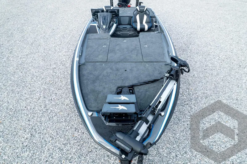 Slide: The Image of 2026 Skeeter FXR21 FLEX boat with spacious deck and modern seating. - 101
