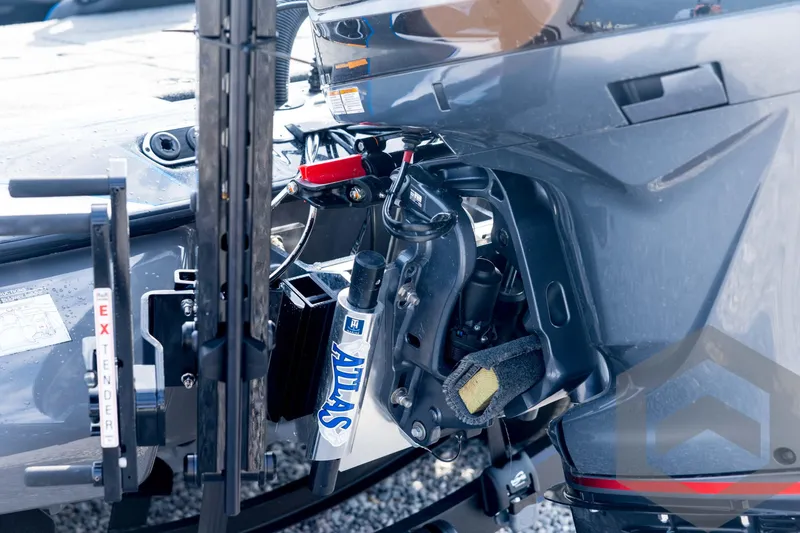 Slide: The Image of 2026 Skeeter FXR21 FLEX boat engine detail with Atlas hydraulic jack plate. - 27