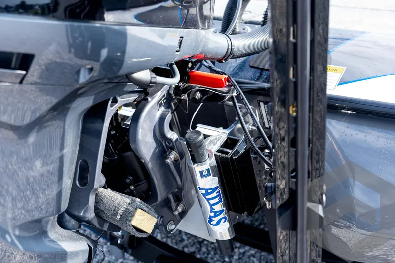 Slide: The Image of Close-up of 2026 Skeeter FXR21 FLEX boat's mechanical components and wiring. - 28