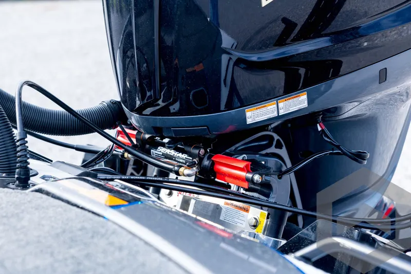 Slide: The Image of 2026 Skeeter FXR21 FLEX boat engine close-up with hydraulic steering system. - 31