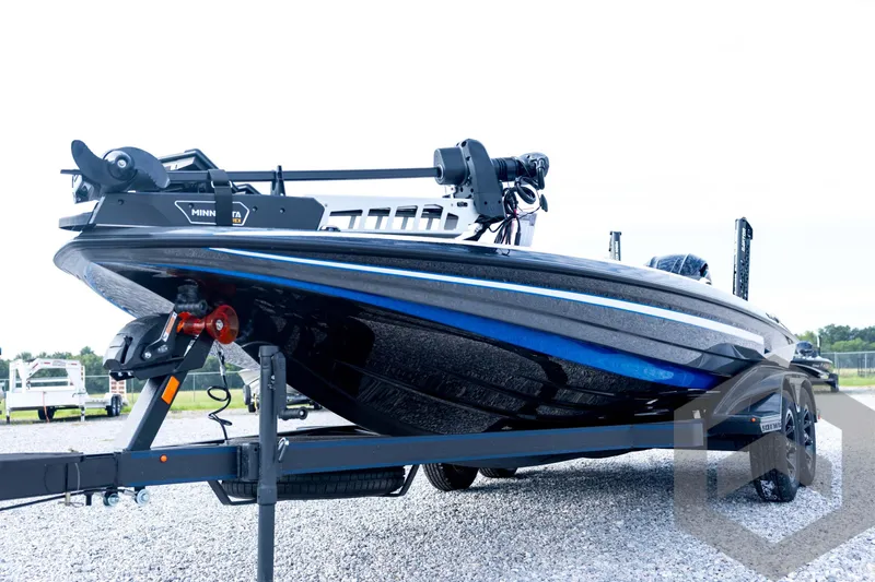 Slide: The Image of 2026 Skeeter FXR21 FLEX boat on trailer, featuring sleek design and modern technology. - 34
