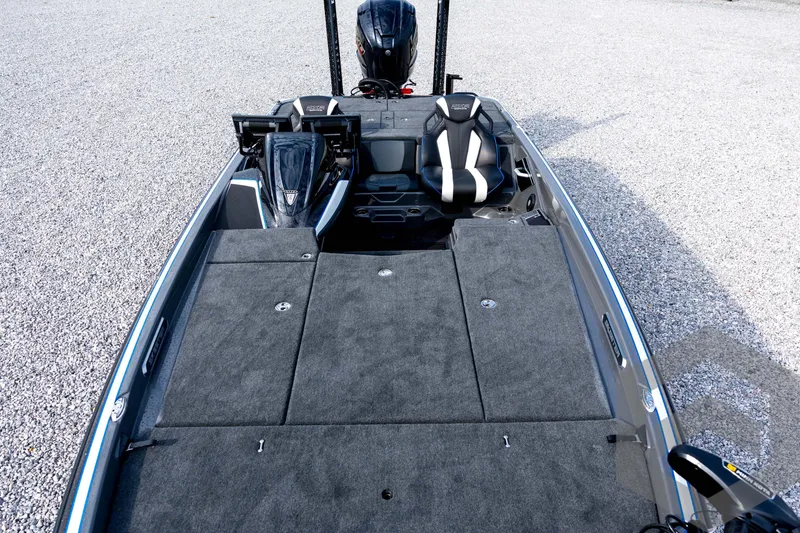 Slide: The Image of 2026 Skeeter FXR21 FLEX boat interior with seating and storage compartments. - 44