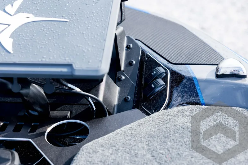 Slide: The Image of 2026 Skeeter FXR21 FLEX boat dashboard with controls and logo, featuring modern design elements. - 47