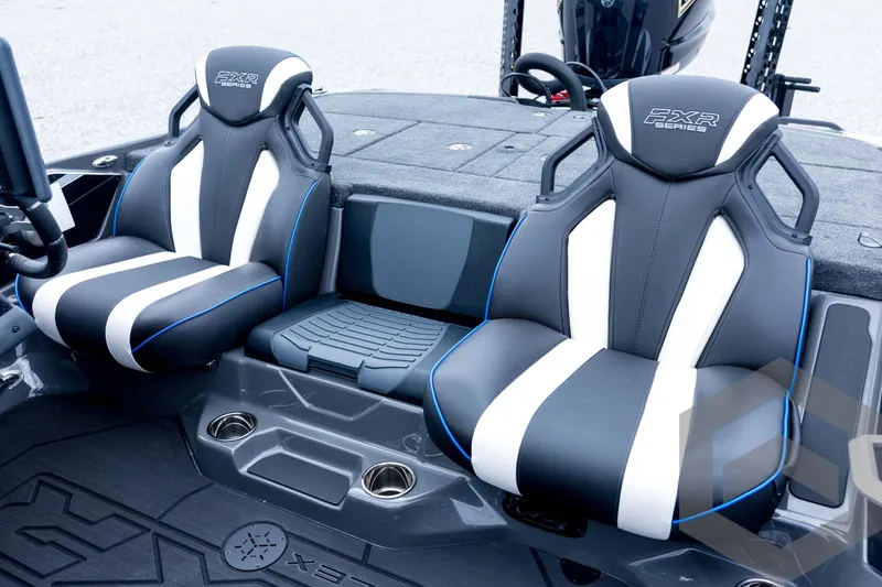 Slide: The Image of 2026 Skeeter FXR21 FLEX boat seats with sleek black and white design. - 61