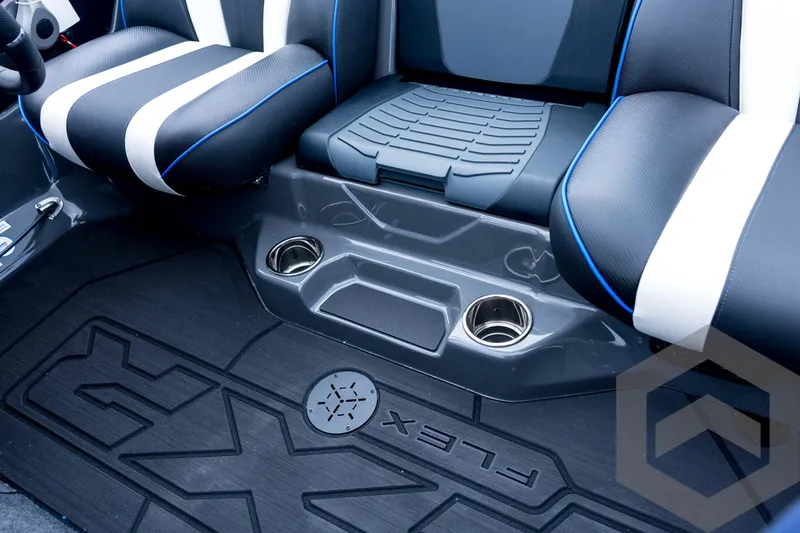 Slide: The Image of 2026 Skeeter FXR21 FLEX interior with stylish seating and cup holders. - 67