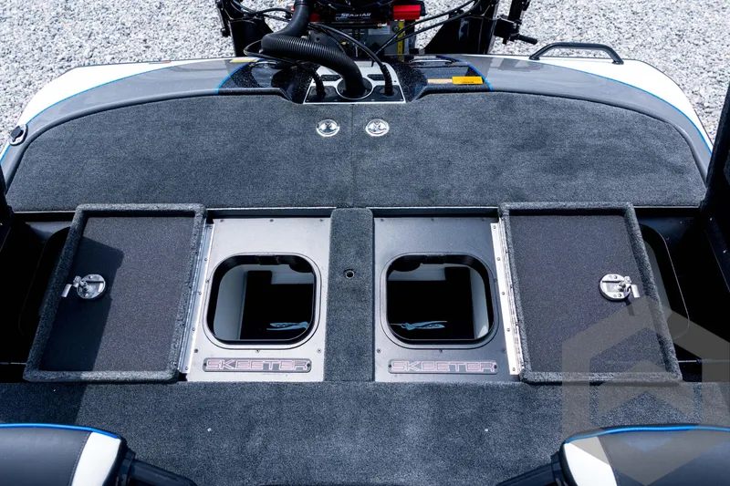 Slide: The Image of 2026 Skeeter FXR21 FLEX boat deck with storage compartments and sleek design. - 77