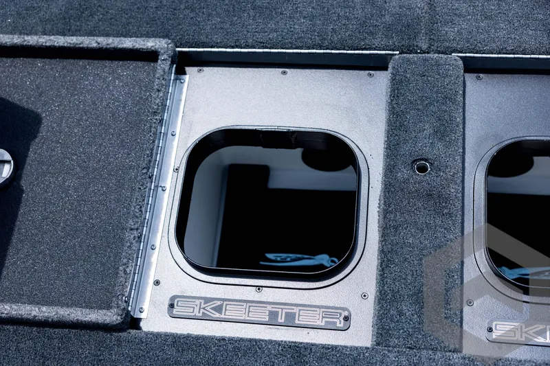 Slide: The Image of 2026 Skeeter FXR21 FLEX boat storage compartments with sleek design and durable materials. - 78