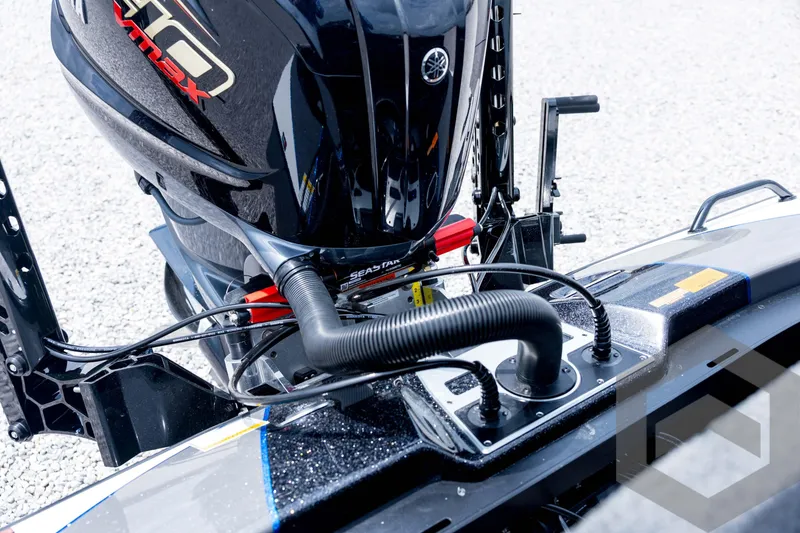 Slide: The Image of 2026 Skeeter FXR21 FLEX boat engine detail with advanced wiring and controls. - 87