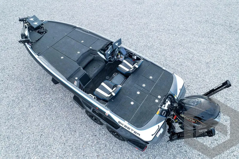 Slide: The Image of 2026 Skeeter FXR21 FLEX fishing boat, aerial view, sleek design, spacious deck, modern features. - 93