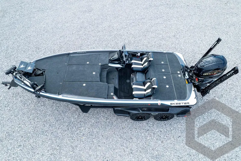 Slide: The Image of 2026 Skeeter FXR21 FLEX fishing boat, aerial view, dual seats, Yamaha engine, sleek design. - 94