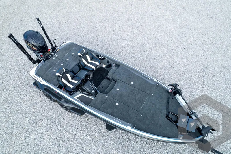 Slide: The Image of 2026 Skeeter FXR21 FLEX boat, aerial view, showcasing spacious deck and seating. - 97