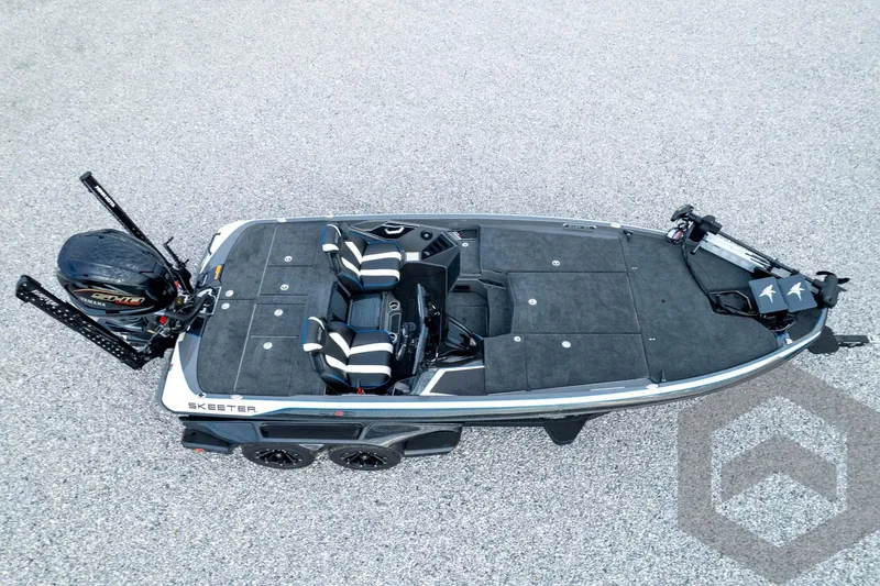Slide: The Image of 2026 Skeeter FXR21 FLEX boat, aerial view, featuring dual seats and Yamaha engine. - 98