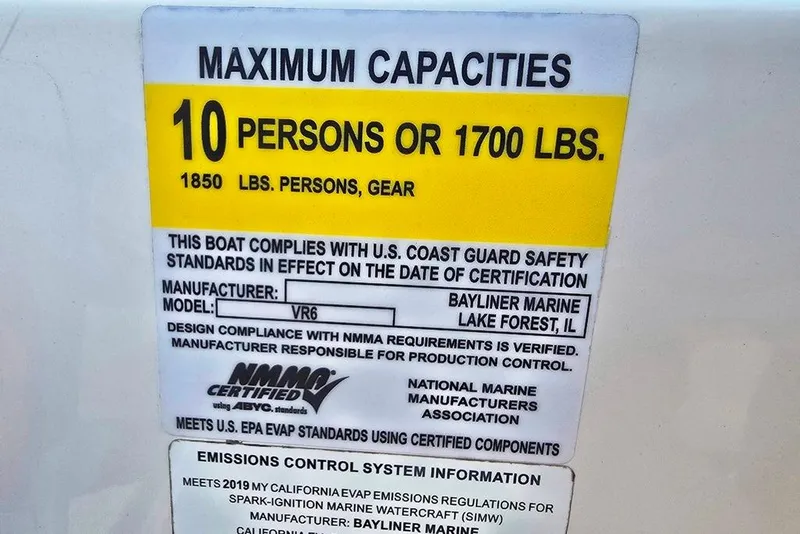 Slide: The Image of 2019 Bayliner VR5 Bowrider I/O capacity label, 10 persons or 1700 lbs, safety compliance. - 21