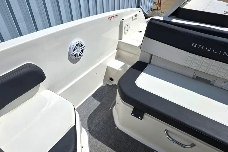 Slide: The Image of 2019 Bayliner VR5 Bowrider I/O interior with seating and speaker detail. - 9