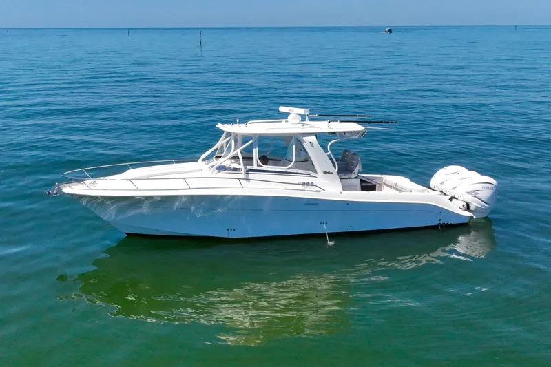 Slide: The Image of 2008 Hydra-Sports Vector 3500 VX boat on calm blue water. - 1