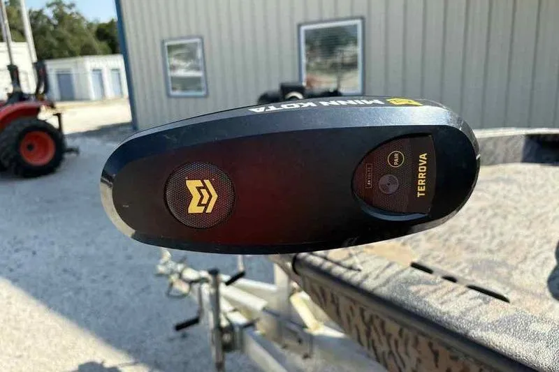 Slide: The Image of 2020 Xpress H20B Bay boat with Minn Kota Terrova trolling motor, outdoor setting. - 14