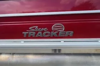 Slide: The Image of 2026 Sun Tracker Party Barge 22 DLX logo on red background. - 10