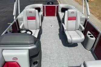 Slide: The Image of 2026 Sun Tracker Party Barge 22 DLX interior with gray and red seating. - 4