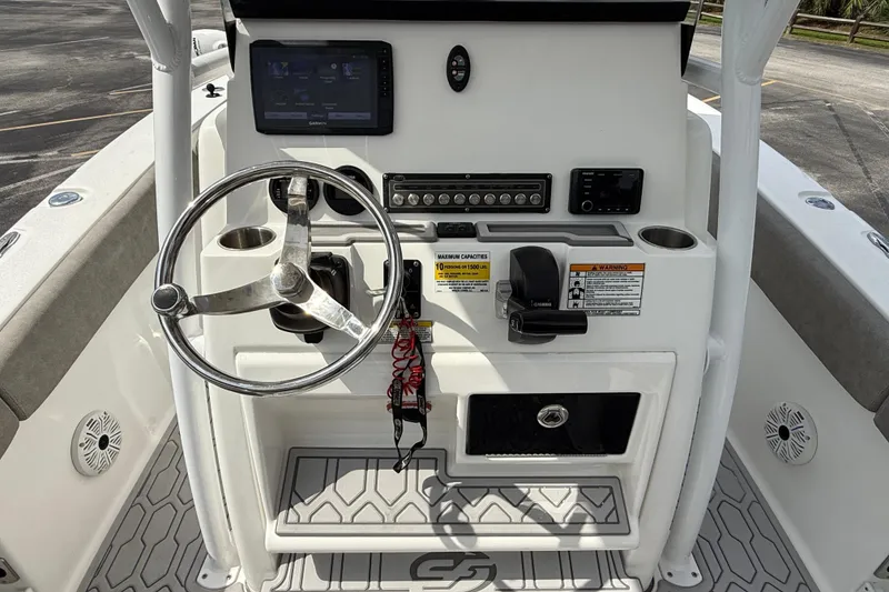 Slide: The Image of 2021 Sea Fox 248 Commander boat console with steering wheel and control panel. - 14