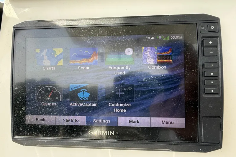 Slide: The Image of Garmin marine display on 2021 Sea Fox 248 Commander, showing navigation and sonar options. - 15