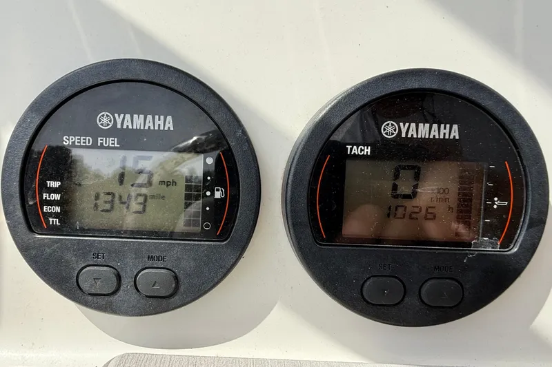 Slide: The Image of Yamaha speed and tachometer gauges on a 2021 Sea Fox 248 Commander boat. - 16