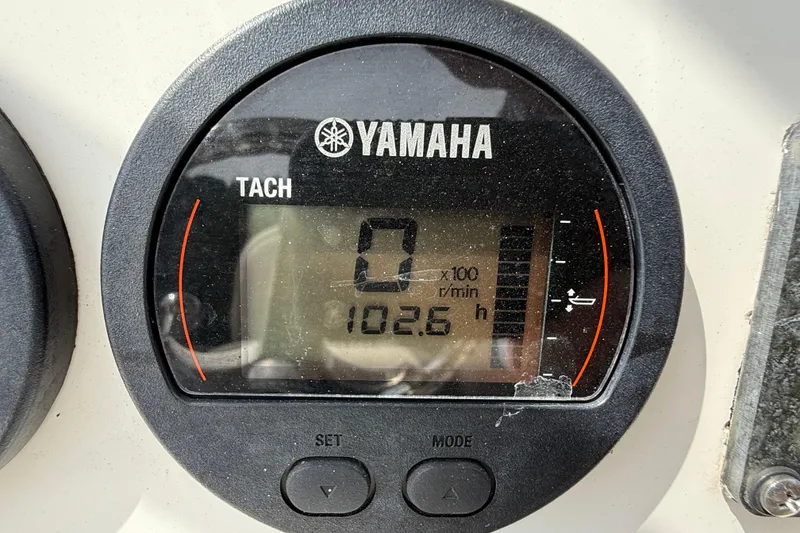 Slide: The Image of Yamaha tachometer on 2021 Sea Fox 248 Commander, displaying 102.6 hours. - 17