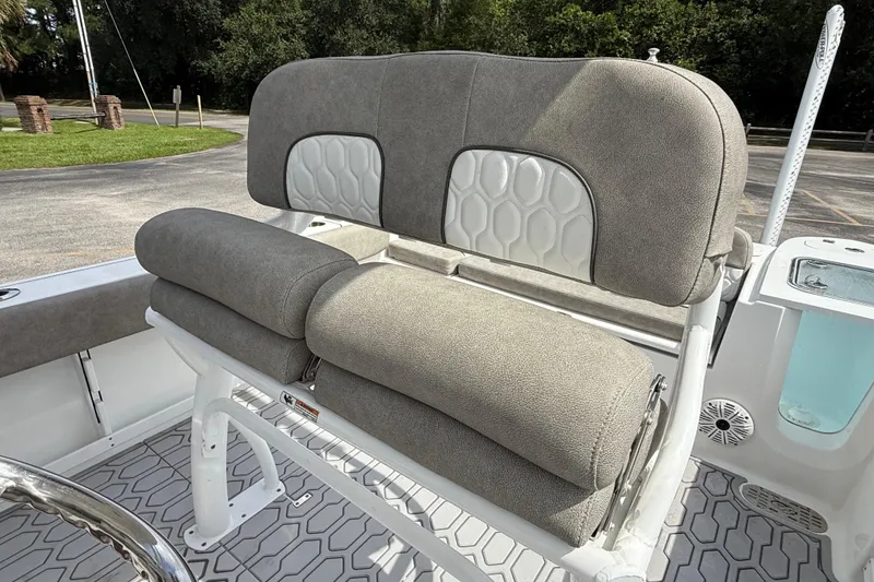 Slide: The Image of 2021 Sea Fox 248 Commander boat seat with gray and white cushioned design. - 20