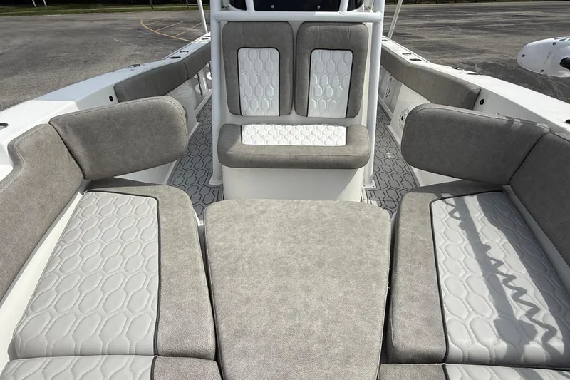 Slide: The Image of 2021 Sea Fox 248 Commander boat interior with cushioned seating and modern design. - 23