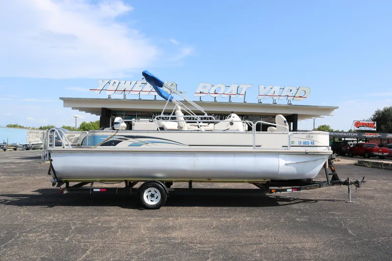 The Image of 2005 G3 SunCatcher LX 22 Fish & Cruise pontoon boat at a boat yard. - 0