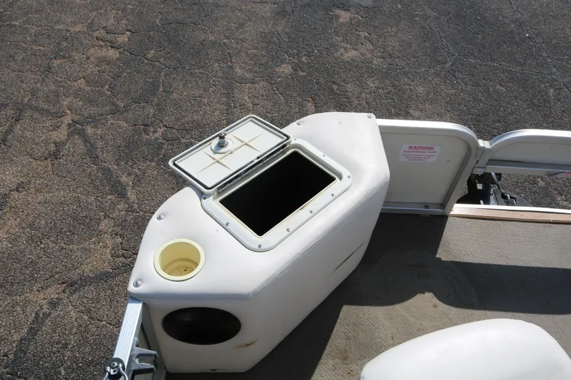 Slide: The Image of 2005 G3 SunCatcher LX 22 Fish & Cruise boat storage compartment with open lid. - 11