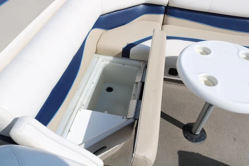 Slide: The Image of 2005 G3 SunCatcher LX 22 Fish & Cruise boat interior with storage and table. - 18