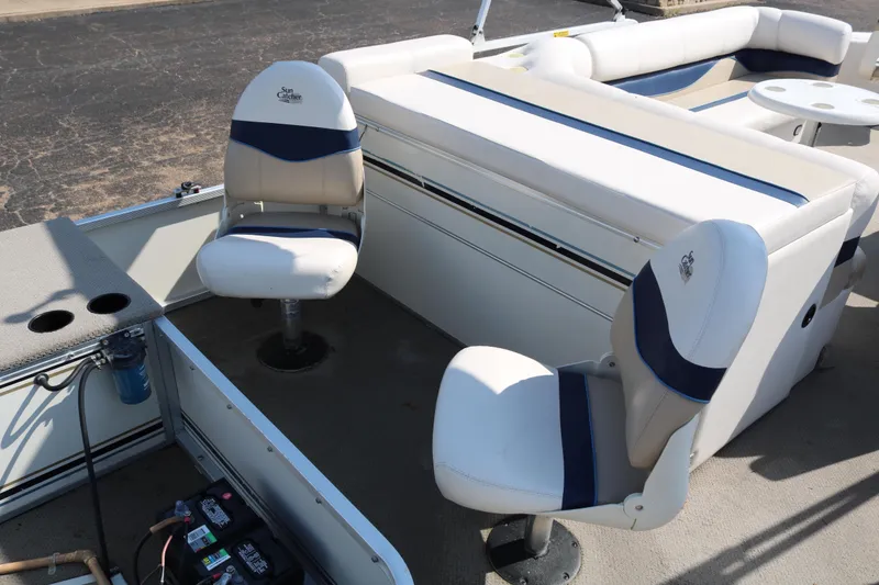 Slide: The Image of 2005 G3 SunCatcher LX 22 Fish & Cruise boat interior with seating and battery compartment. - 23