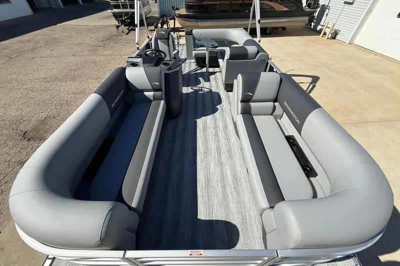Slide: The Image of 2026 Bennington 22 SLJ pontoon boat with sleek gray seating and modern design. - 11