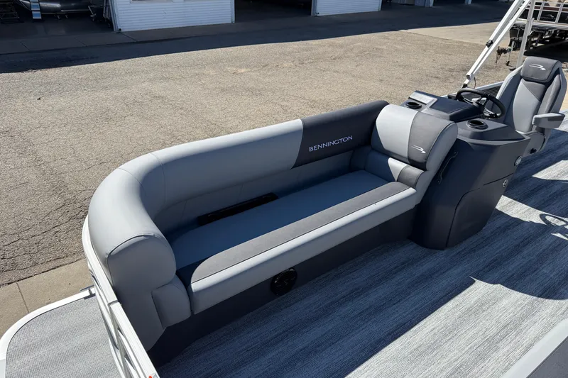 Slide: The Image of 2026 Bennington 22 SLJ pontoon boat interior with gray seating and flooring. - 12