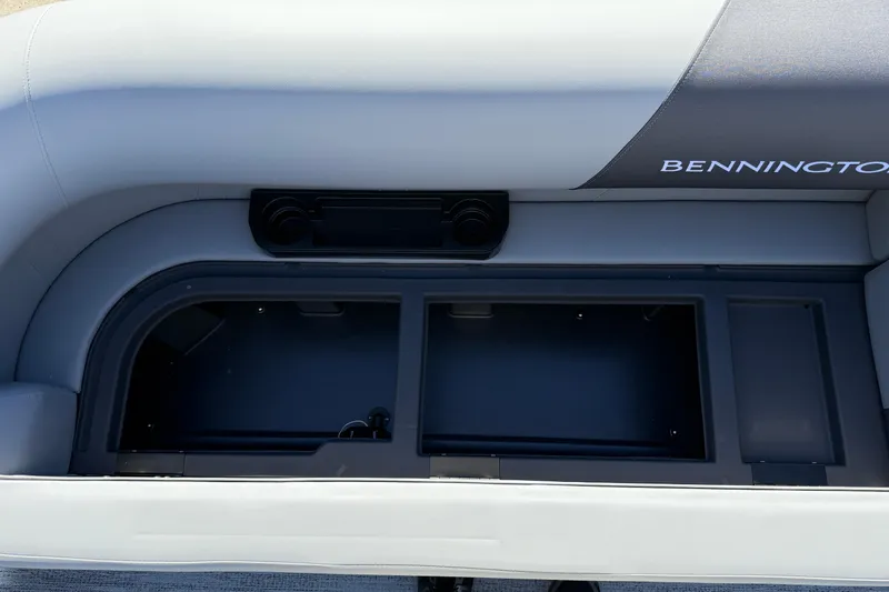 Slide: The Image of 2026 Bennington 22 SLJ pontoon boat interior with gray seating and table. - 17