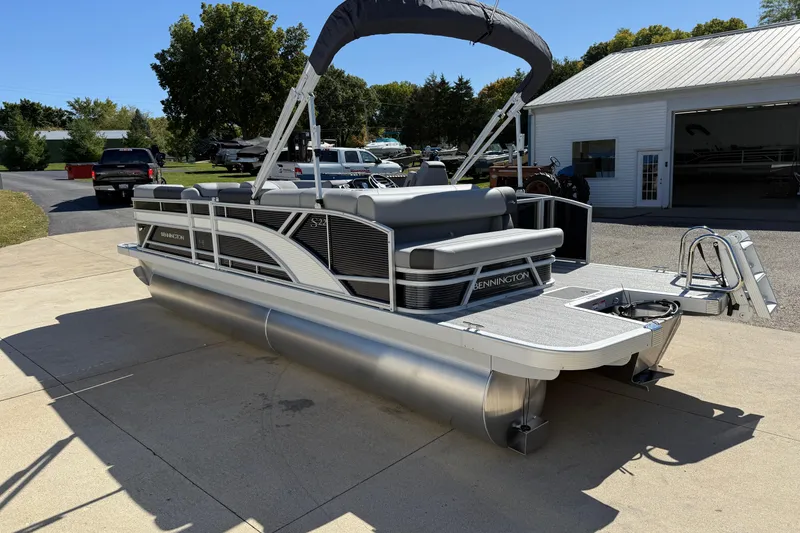 Slide: The Image of 2026 Bennington 22 SLJ pontoon boat with spacious seating and modern design. - 8