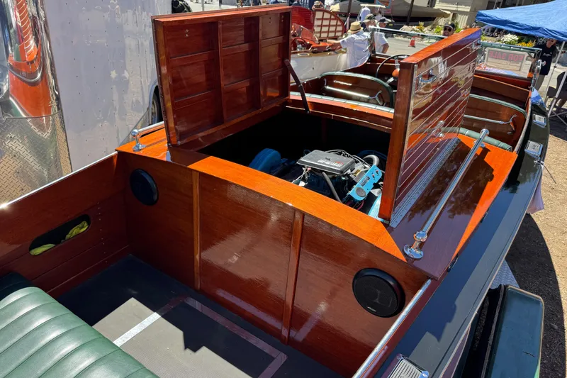 Slide: The Image of 1987 Grand Craft Triple Cockpit Runabout with open engine compartment, showcasing polished wood finish. - 10